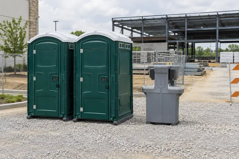 Portable restrooms at an illustrative building site