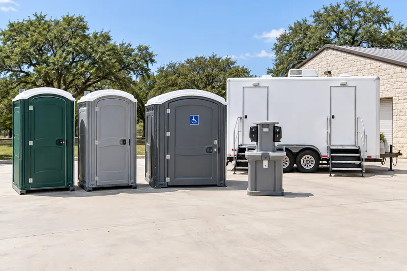 Illustrative lineup of temporary restroom equipment